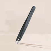 Our Signature Slanted Tweezers are perfectly angled top quality tweezers with a very precise tip that allows for easy and comfortable plucking. The Blackout model has a soft-touch rubber grip for smooth feeling and superior control of the Tweezer.